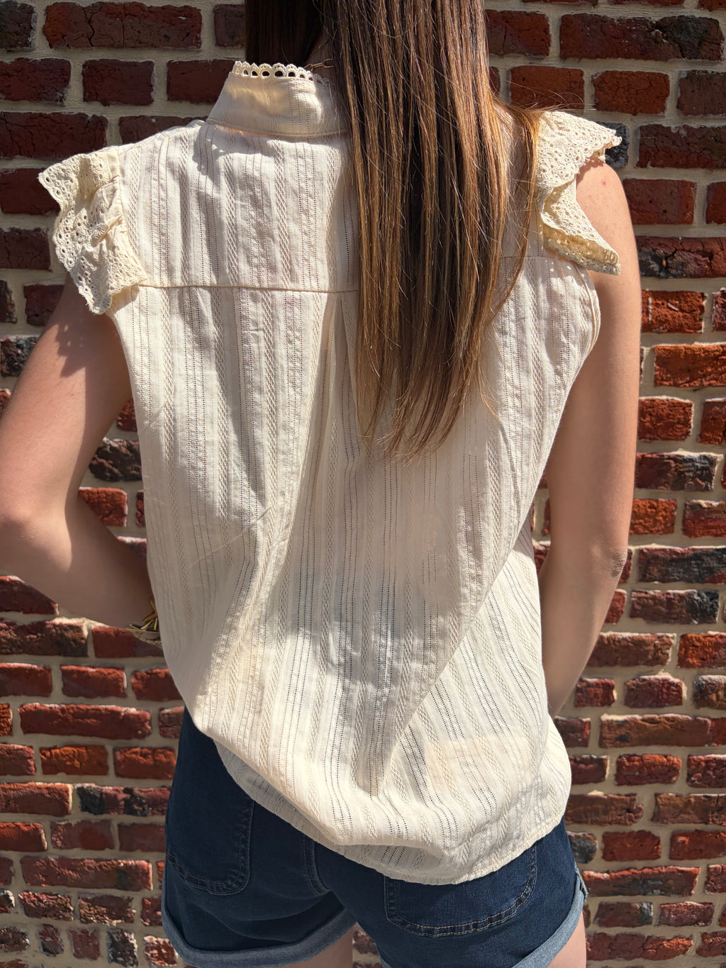 Blouse unie sans manches